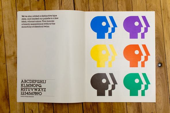 A booklet displaying the PBS logo in 6 different colors.