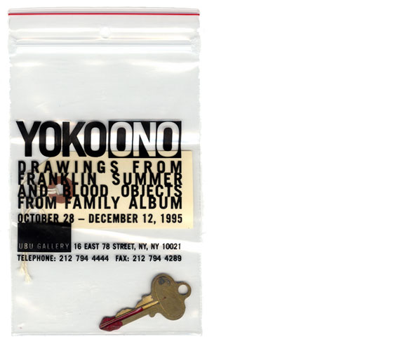 A photo of a clear Plastic bag with black text, "Yoko ono Drawings from franklin Summer and blood objects from a family album" ; a luggage tag and a gold key dipped in red paint that looks likes blood are visible inside