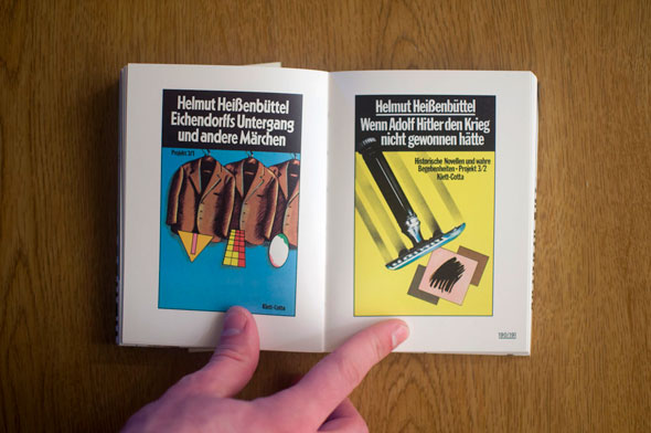 Flipbook opened to show a spread depicting two propaganda posters, left with a rack of brown coats against a blue background and right  with a razor and a depiction of Hitler's mustache