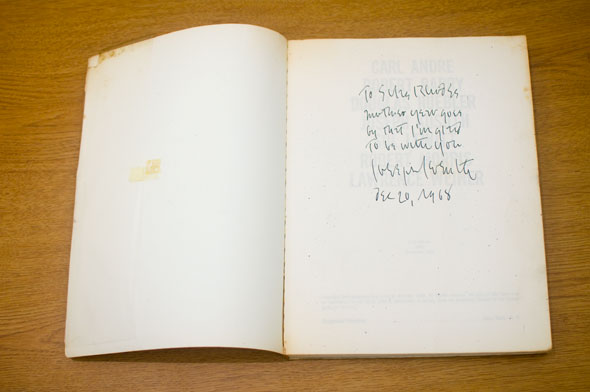 Book spread; left page is blank, right page shows a block of handwritten text