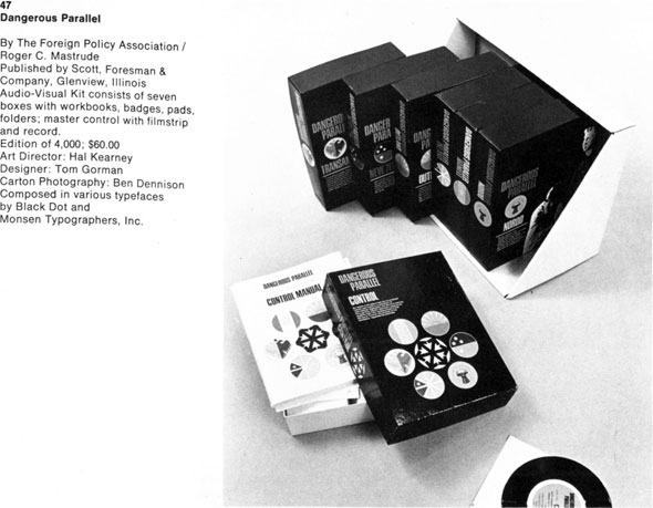 Photograph of seven kit-books containing badges, pads, folders, a filmstrip and a vinyl record