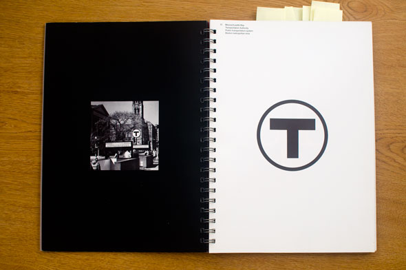 Spread; right page is a black and white graphic of a letter T in a circle, left page a black and white photo of the graphic as a sign in an outdoors setting