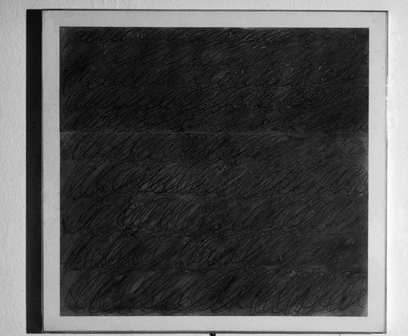 Close up of an all black painting made of rows of looping lines