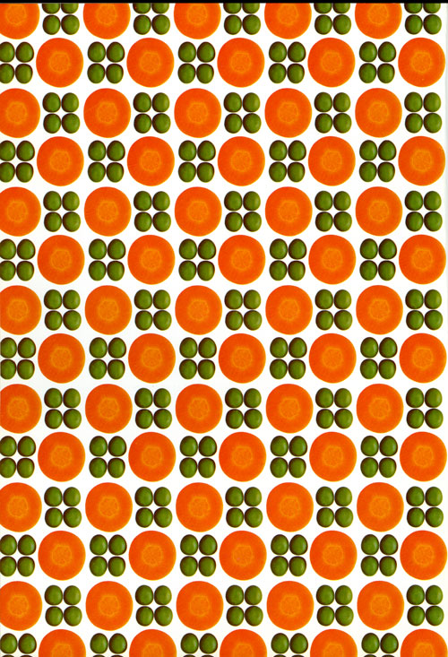 A colored pattern of peas and carrots, arranged in an almost checkered-like design.