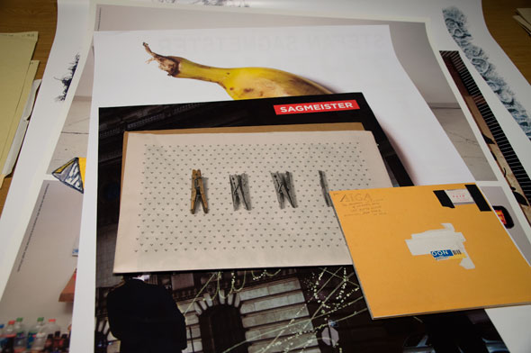 Stack of posters among other materials in the archives