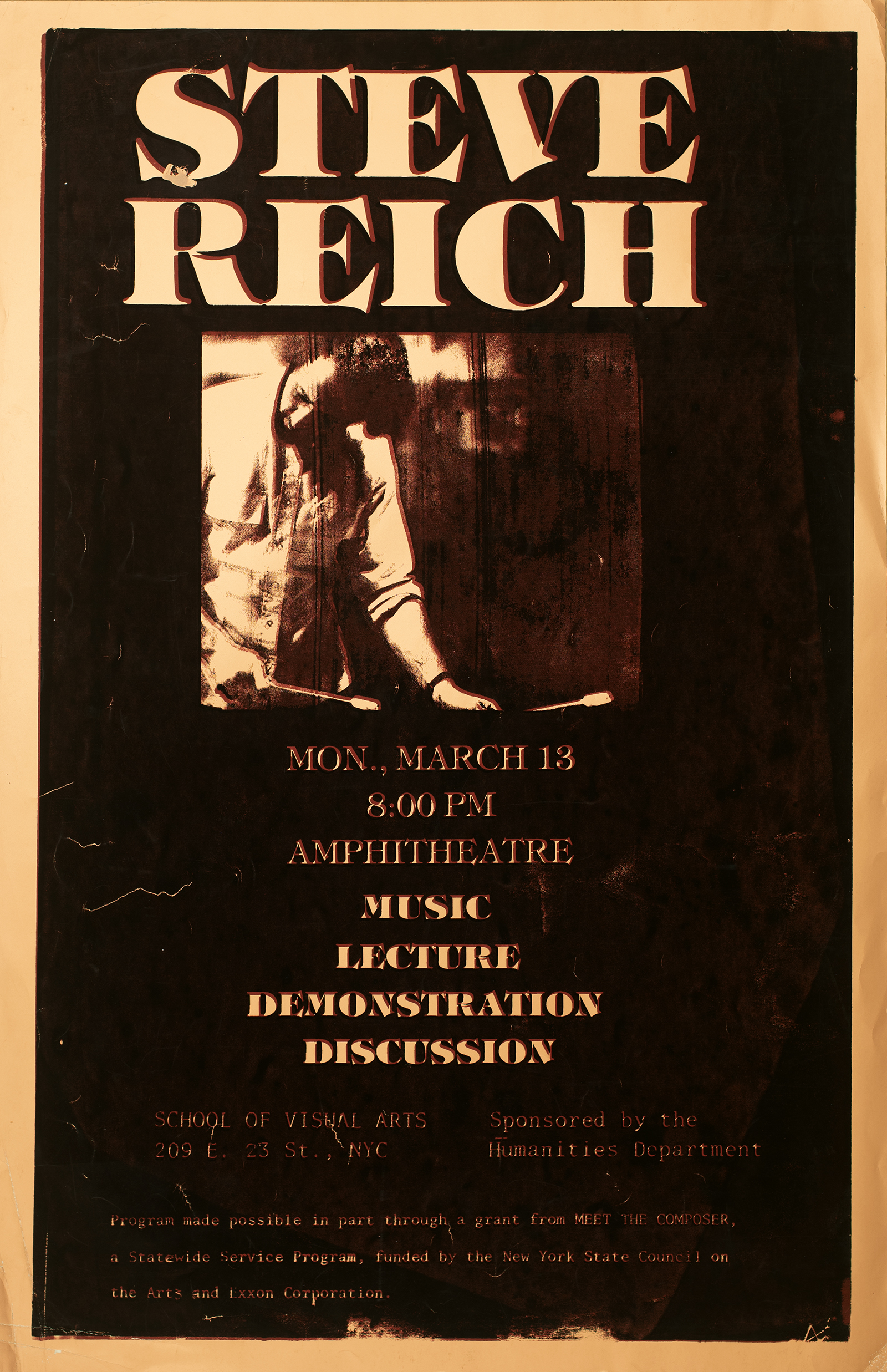 A black poster with a small square sepia photo in the middle of a bearded man with two drum mallets. Above the picture in big white text reads "Steve Reich" below in a smaller font is location and date.
