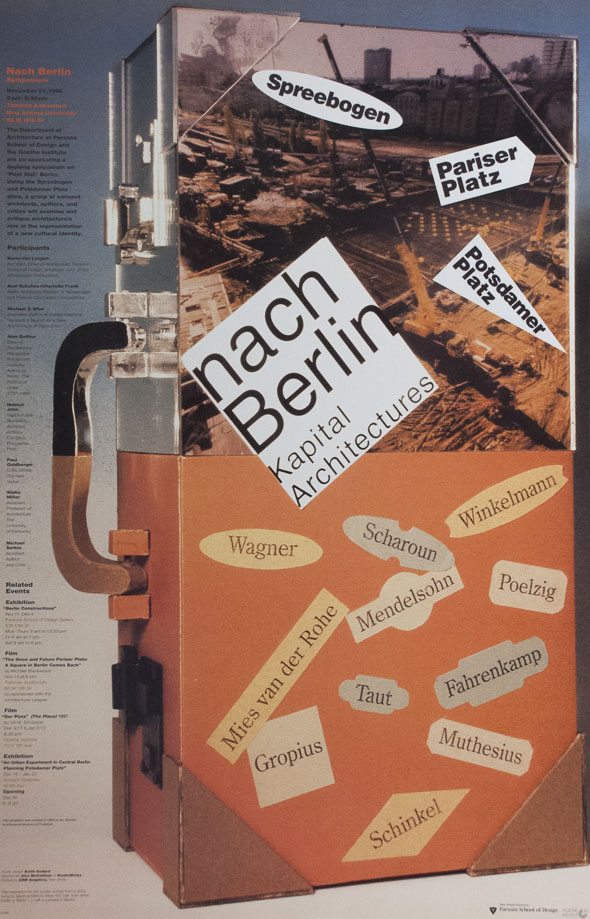 An orange metal case with a cover including an image of Berlin, Germany, and stickers of various german language text.