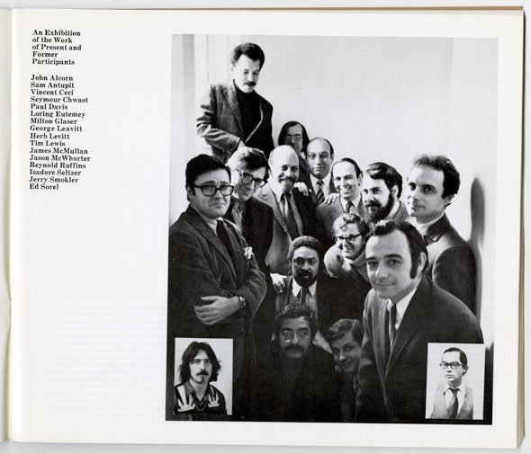 Black and white photo of a large group of men looking into the camera, mostly smiling