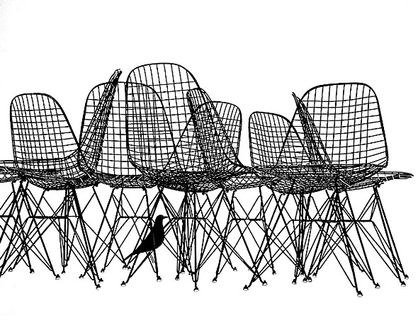 Photo of a cluster of wire chairs against a white background