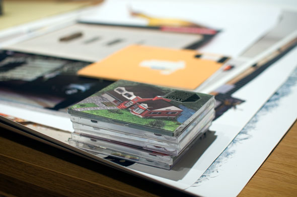 Stack of CDs, among other materials in the archives