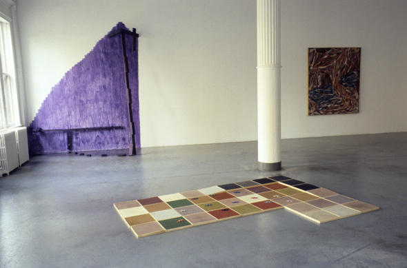 Color photograph of Tribeca gallery's first show; wall installation, floor installation and painting are visible