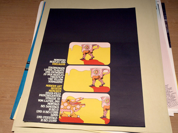 Bright yellow, red, pink and orange poster for Edelmann exhibition featuring two strange creatures.