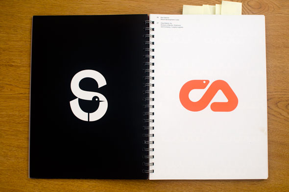 Spread of two graphics; left is a white letter S with a stylized bird in the negative space against a black background; right is a design of orange snake against a white background.
