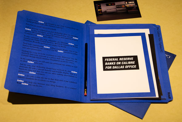 Bright blue mailer opened to show contents