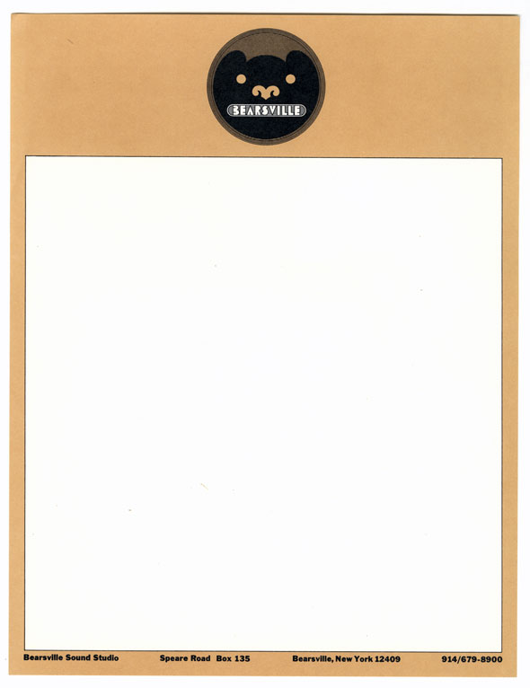 Blank white square surrounded by tan border with a circle with a black bear popping up with a white text that reads " Bearsville"