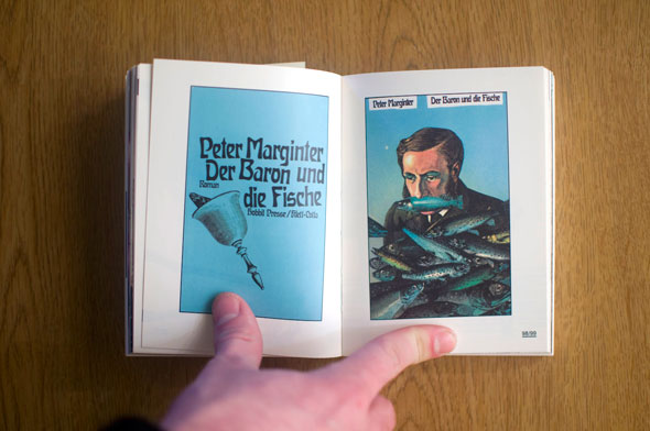 Flipbook opened to show a spread depicting two blue posters, left with text and a bell, right with a man surrounded by fish