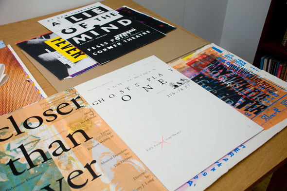 A picture of several silkscreen theater posters. In the front, the poster for " Ghosts play one" is minimalistic with a plain white background and the text of the title are spread out unevenly. Next to it is a poster for "Closer than ever" the title takes up the poster which has an orange/green print of a woman in the background. Both posters cover posters underneath it.