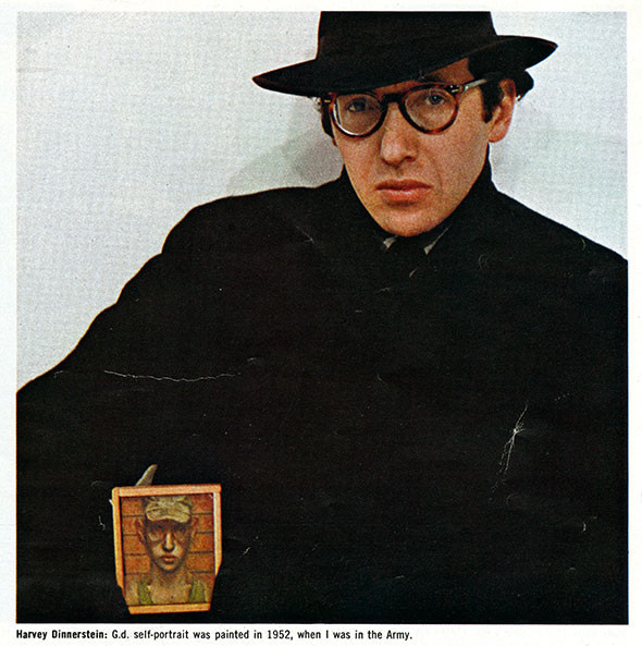 Harvey Dinnerstein, posing with a small self-portrait of his time in the Army.
